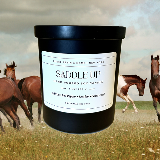 A black candle jar on a background with running horses.